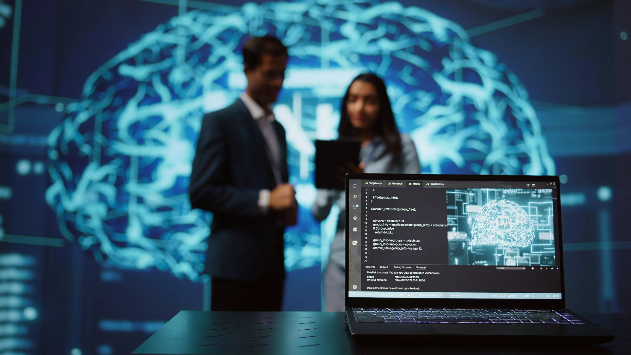 A laptop displaying cloud architecture code in the foreground with two tech professionals discussing in front of a glowing AI neural network visualization, representing an architectural comparison of AWS, Microsoft Azure, and Google Cloud Platform.