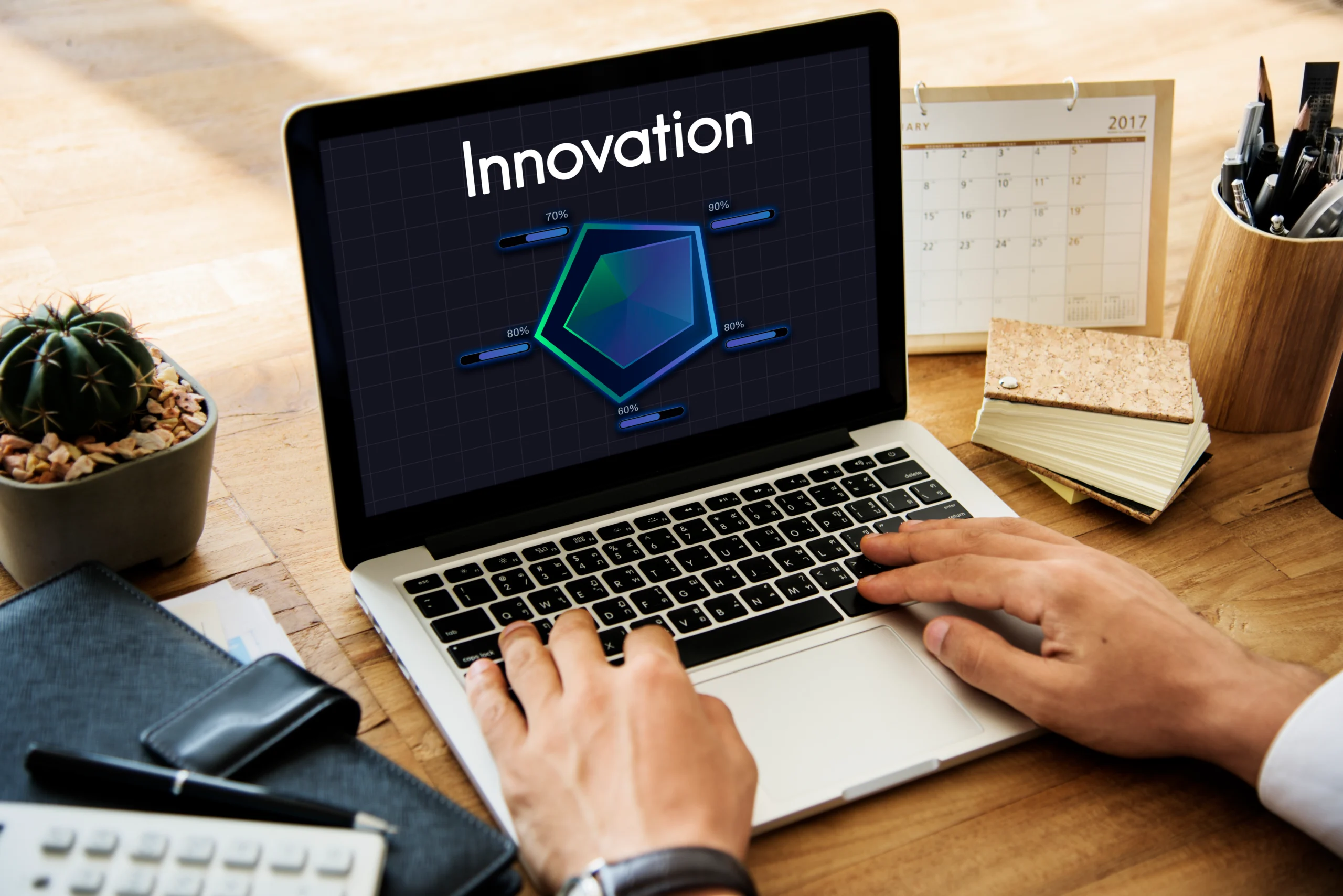 A business professional working on a laptop displaying an innovation performance radar chart, representing the strategic planning involved in legacy system modernization for enterprises.